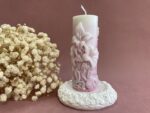 Ароматна свещ върху керамична поставка